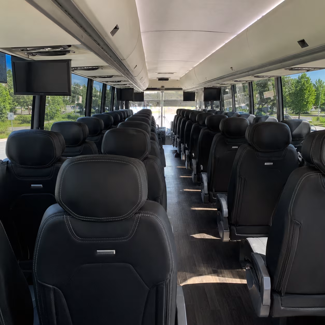 westland michigan international speedway charter bus rental